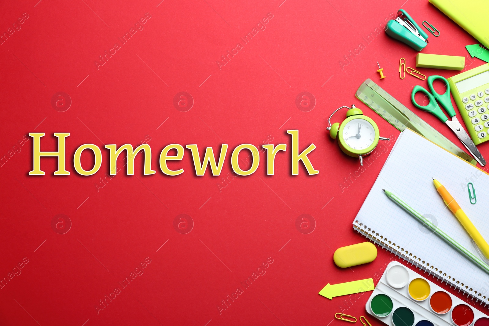 Image of Flat lay composition with school supplies and inscription HOMEWORK on red background 