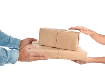 Photo of Woman receiving parcels from courier on white background, closeup