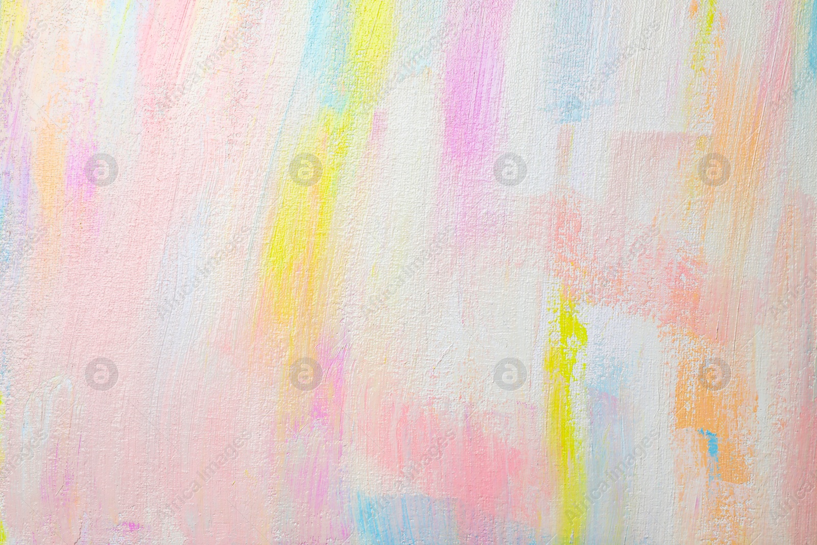 Photo of Strokes of different pastel acrylic paints on white canvas, closeup