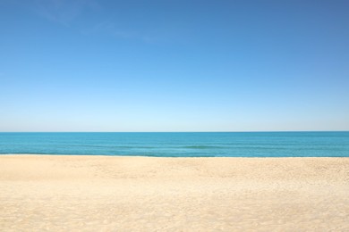 Photo of Picturesque view of sandy beach near sea