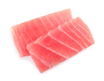Photo of Tasty sashimi (pieces of fresh raw tuna) on white background, top view