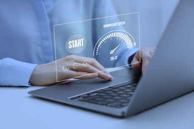 Image of Speed test. Woman using laptop at table, closeup. Virtual screen over device