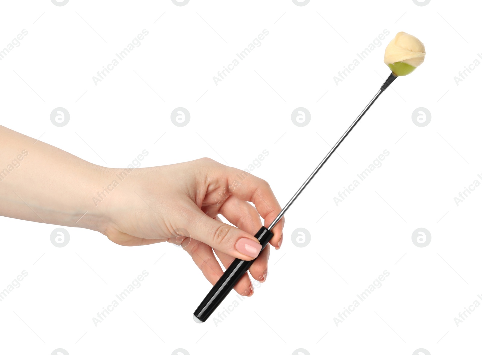 Photo of Tasty fondue. Woman holding fork with grape and melted cheese on white background, closeup