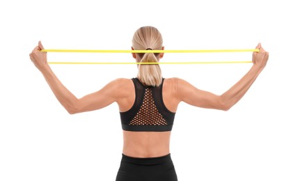 Woman exercising with elastic resistance band on white background, back view