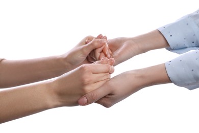 Photo of Women holding hands on white background, closeup