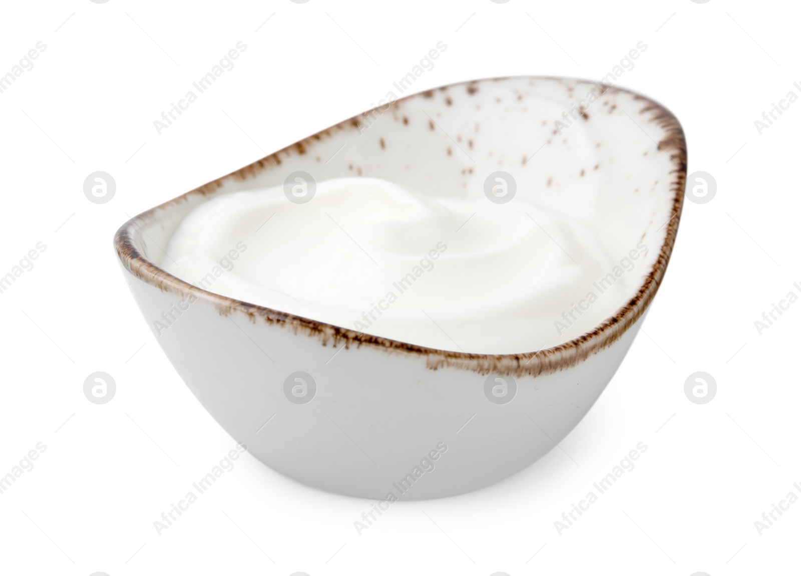 Photo of Delicious natural yogurt in gravy boat isolated on white