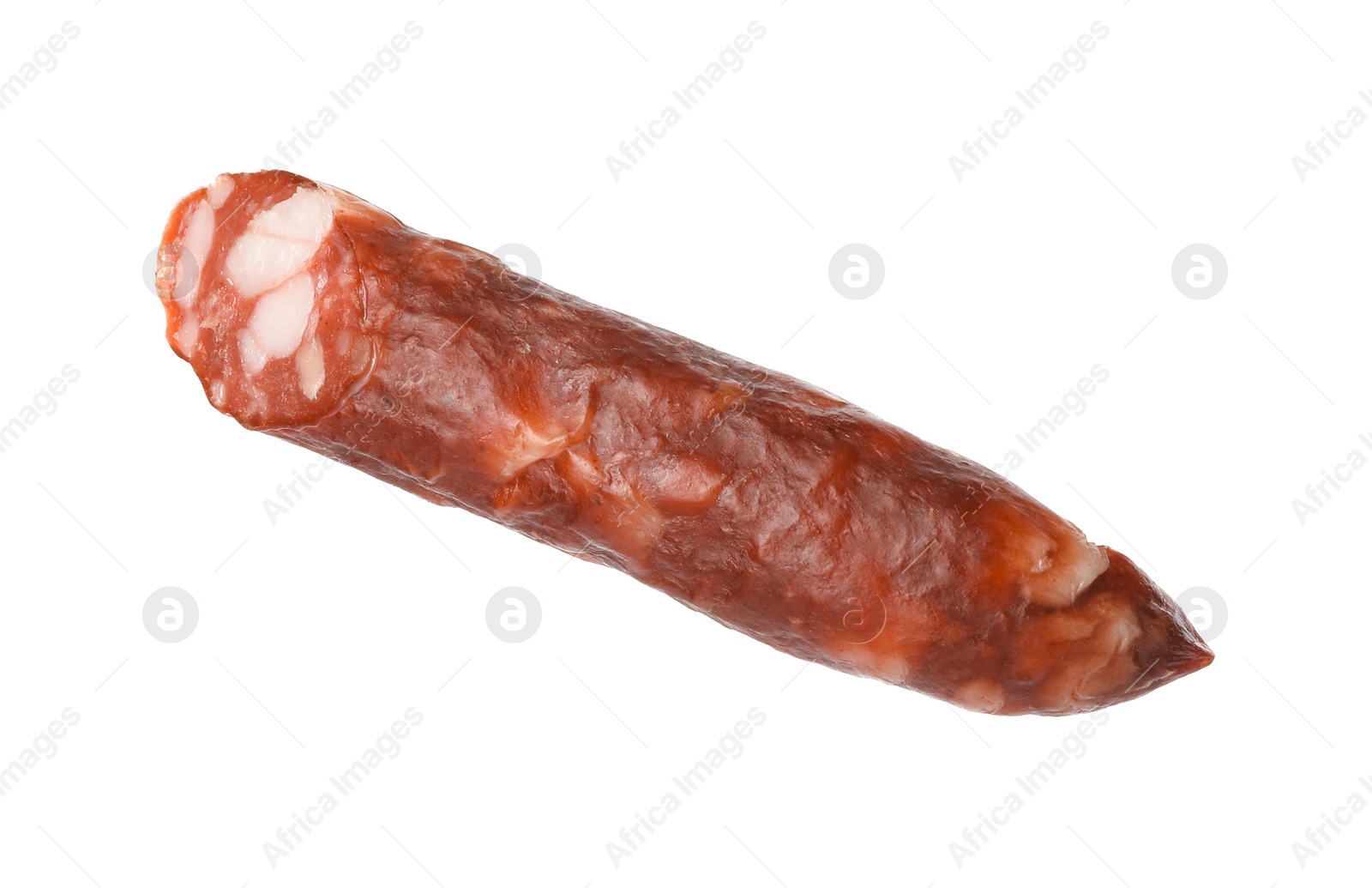 Photo of Piece of thin dry smoked sausage isolated on white