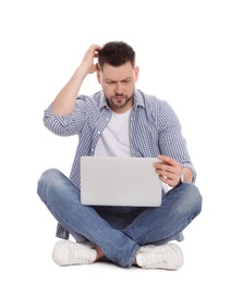 Emotional man with laptop on white background