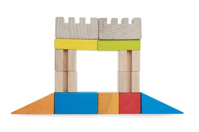 Photo of Wooden gate made of building blocks isolated on white. Educational toy for motor skills development