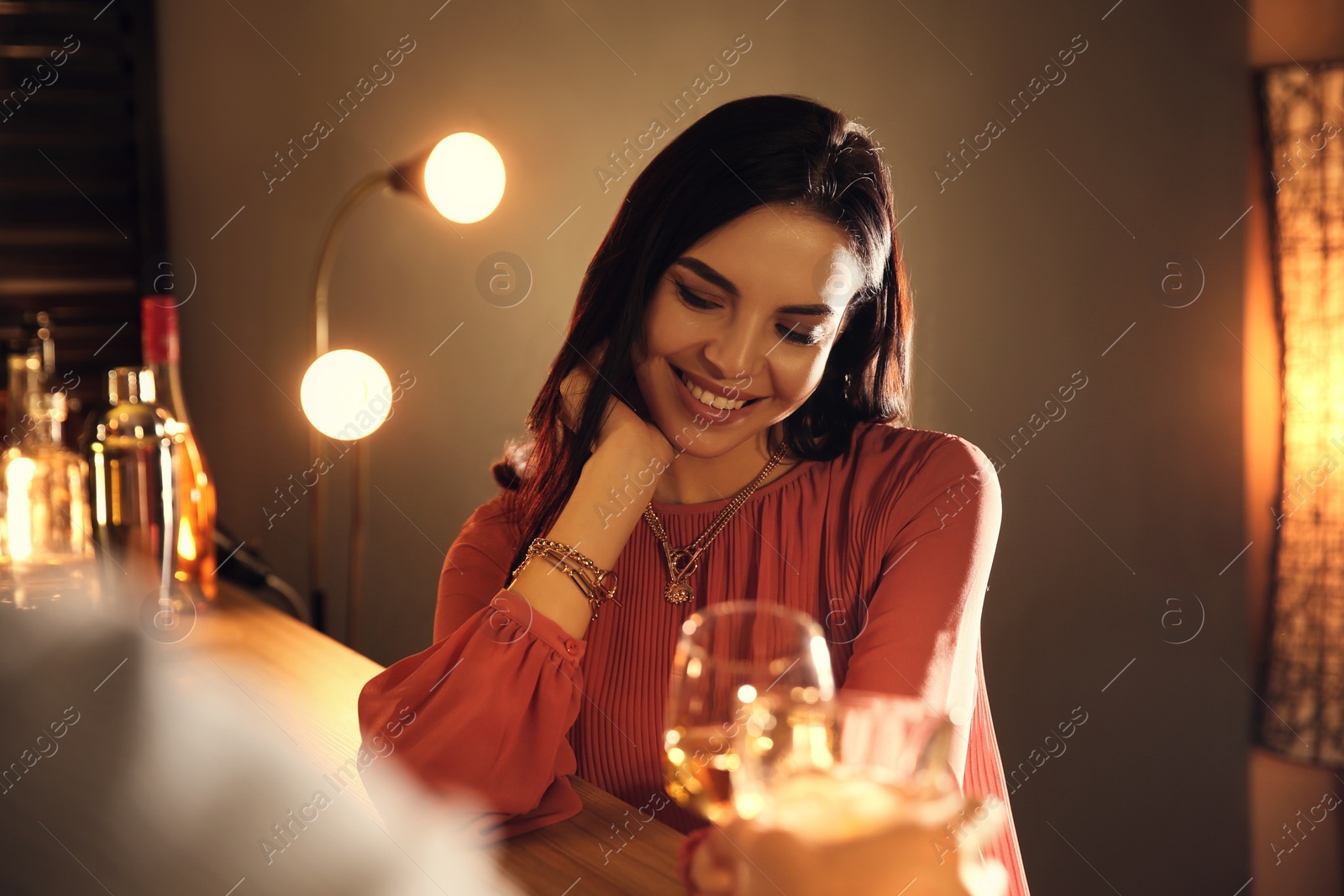 Photo of Man and woman flirting with each other in bar