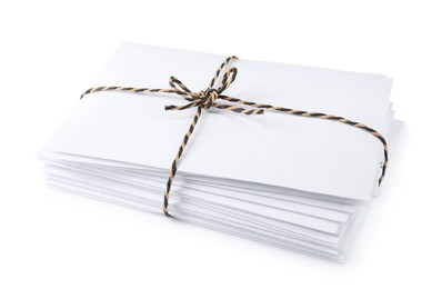 Photo of Stack of letters wrapped with rope on white background