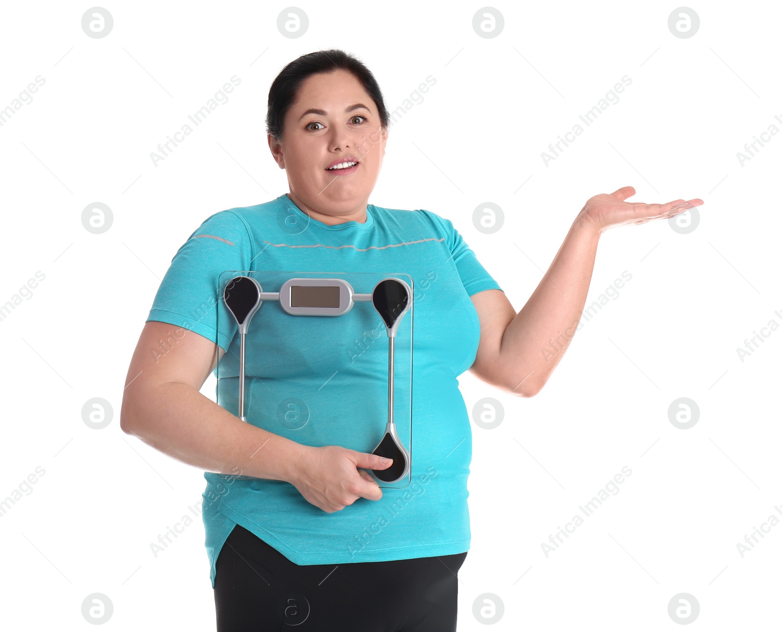 Photo of Overweight woman in sportswear with scales on white background