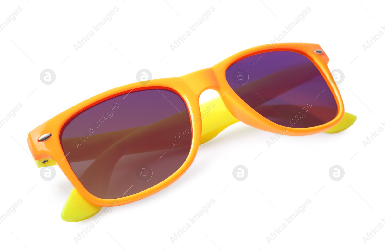 Photo of New stylish sunglasses with yellow frame isolated on white