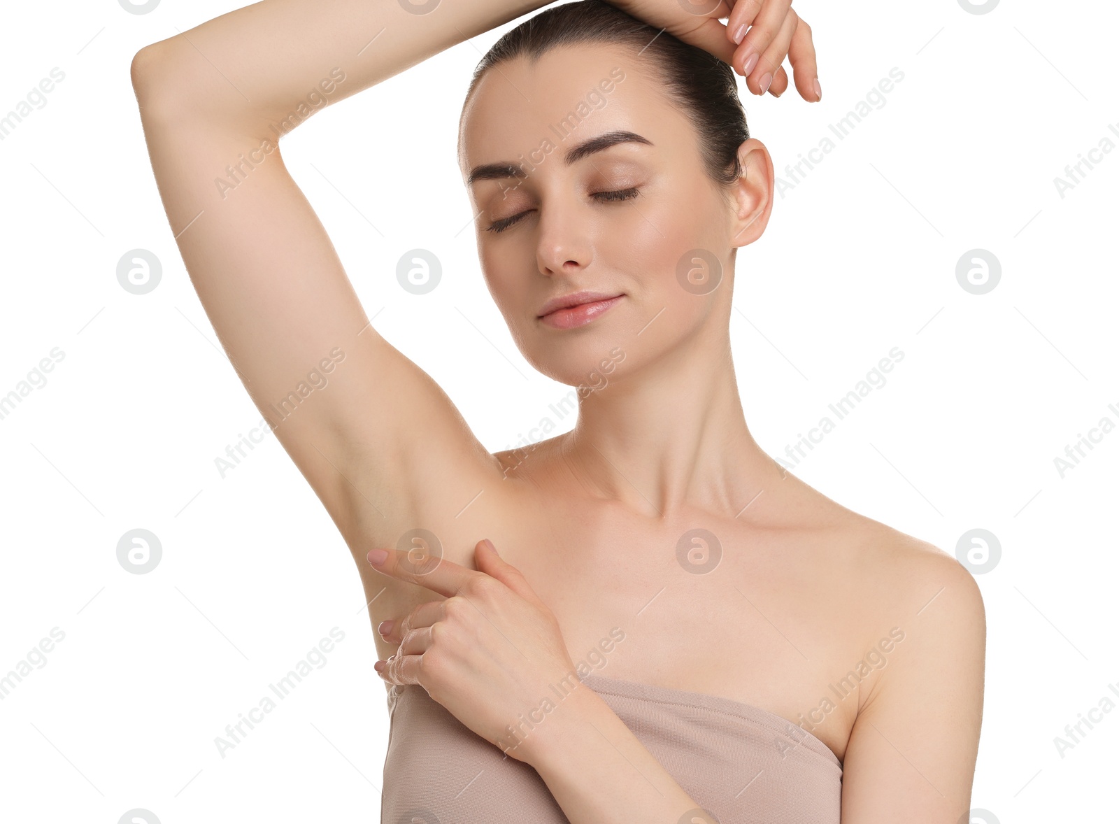 Photo of Beautiful woman showing armpit with smooth clean skin on white background