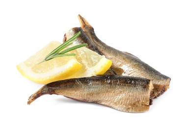 Photo of Tasty canned sprats, lemon and rosemary isolated on white