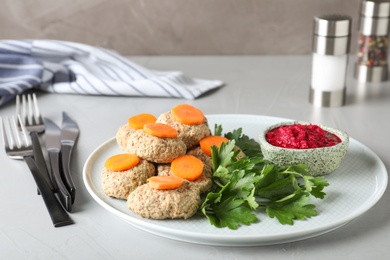 Photo of Plate of traditional Passover (Pesach) gefilte fish on table