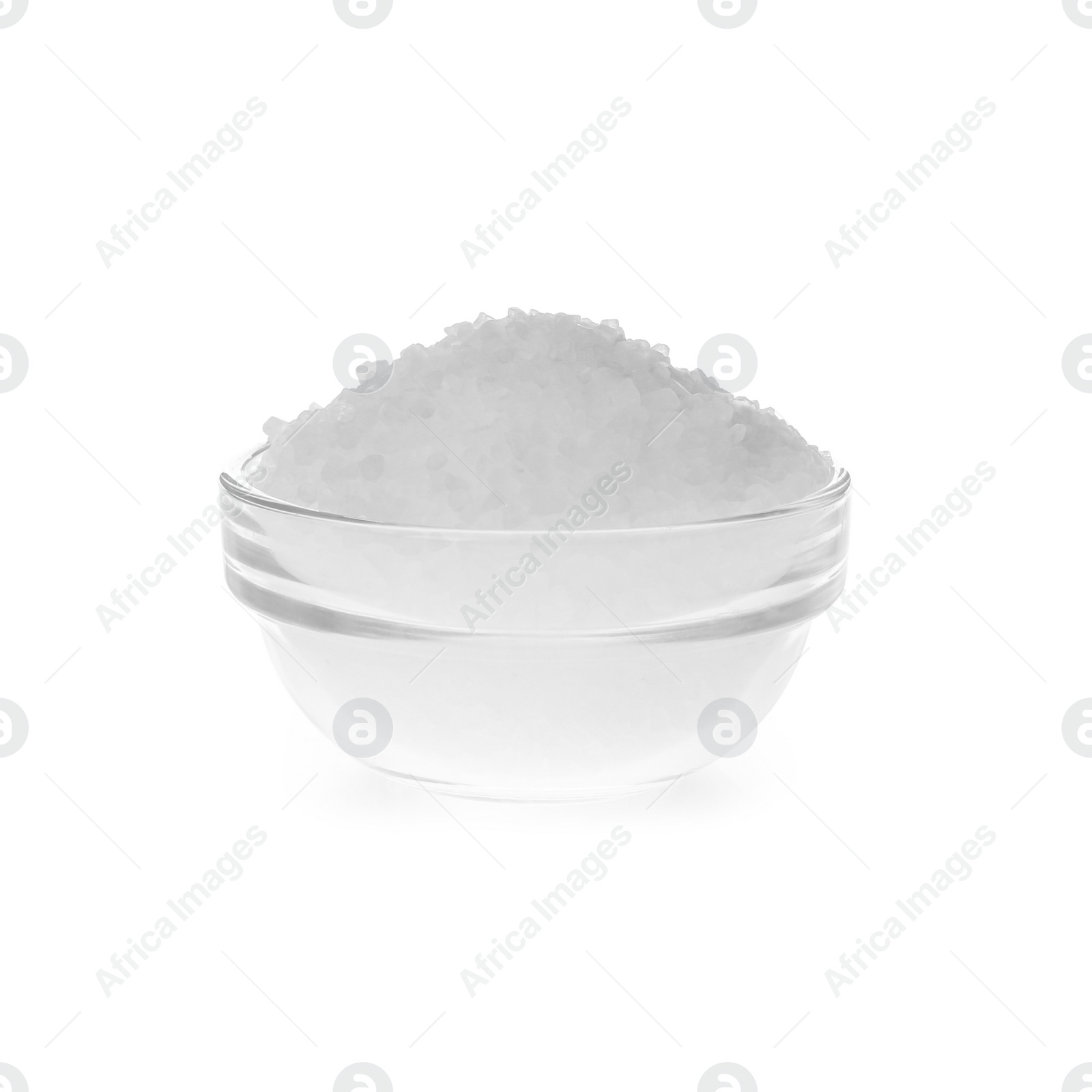 Photo of Natural salt in bowl on white background