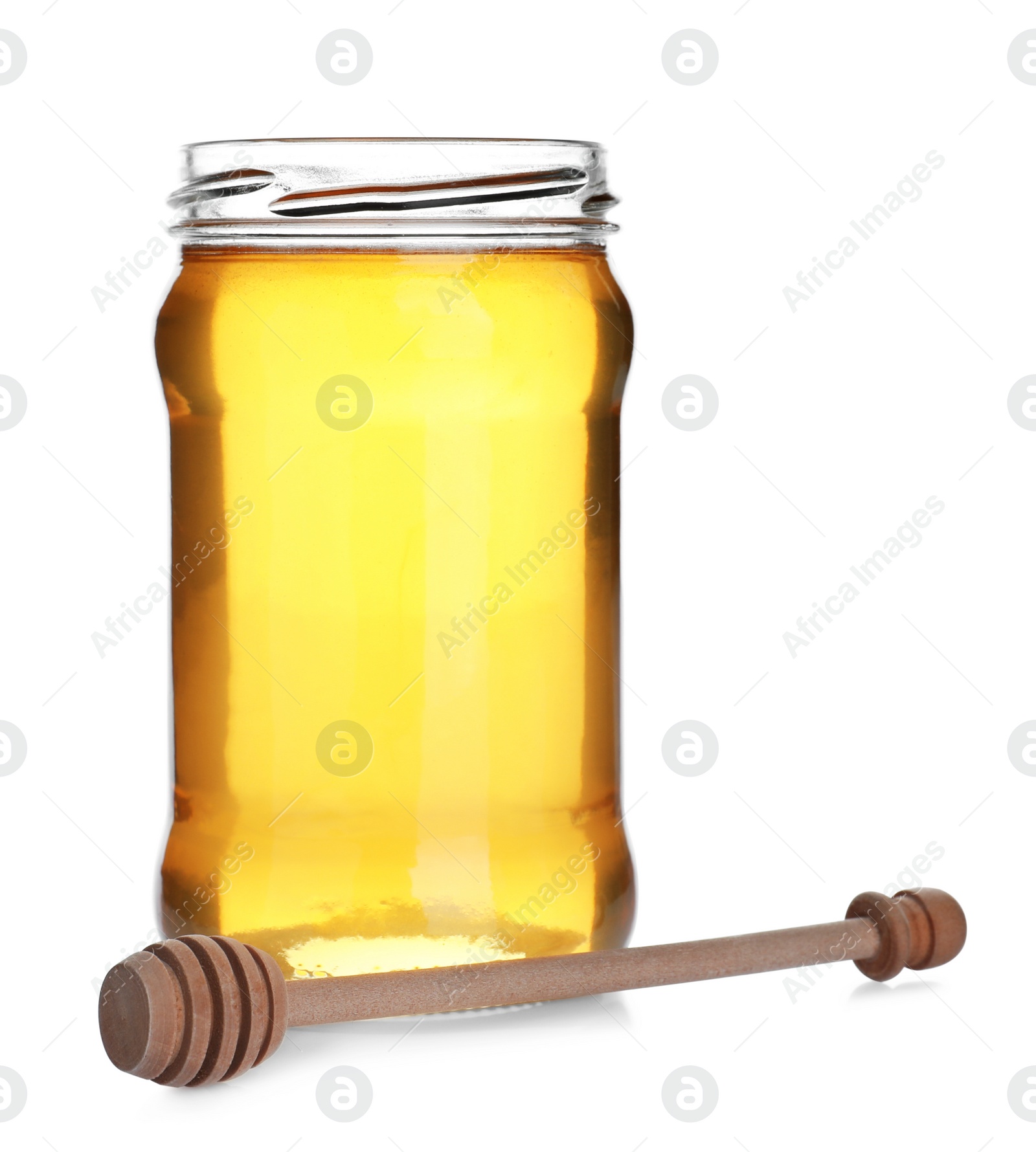 Photo of Jar of organic honey and dipper isolated on white