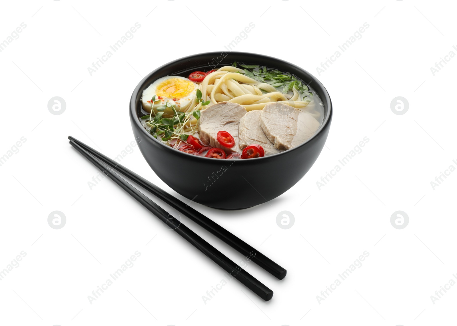 Photo of Delicious ramen with meat in bowl and chopsticks isolated on white. Noodle soup