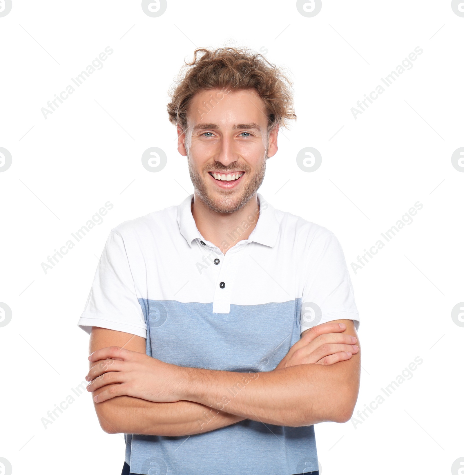 Photo of Young man in casual clothes posing on white background