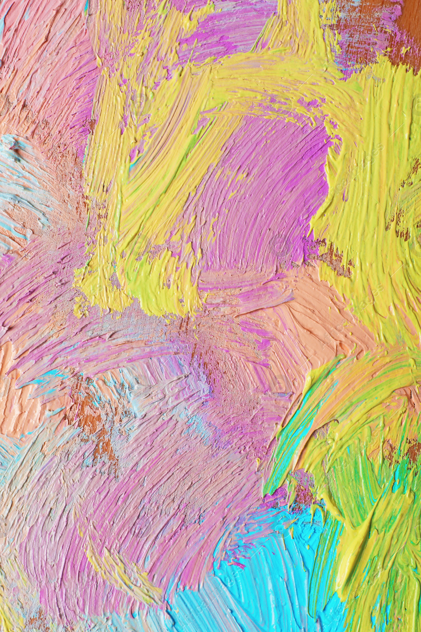 Photo of Closeup view of artist's palette with mixed pastel paints as background