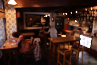 Blurred view of cafe interior with bokeh effect