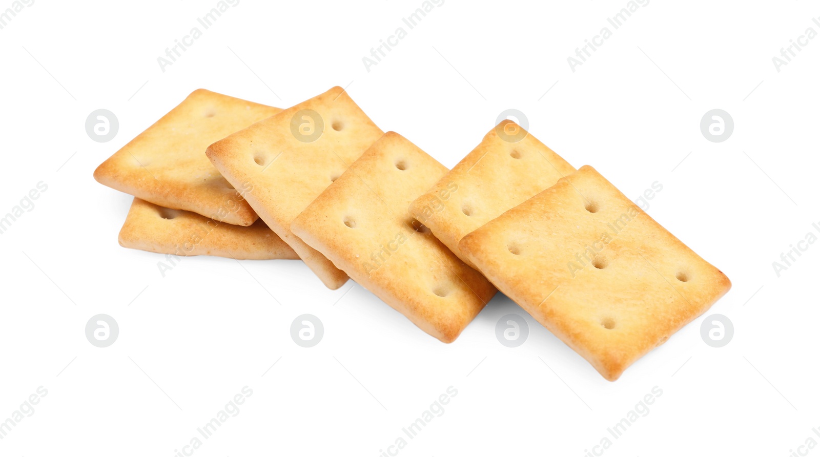 Photo of Tasty crispy square crackers isolated on white