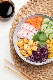 Delicious salad with chicken, vegetables and spinach on white wooden table, flat lay