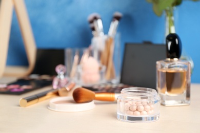 Set of luxury cosmetics on dressing table. Space for text