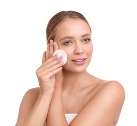 Photo of Beautiful young woman with cotton pad on white background