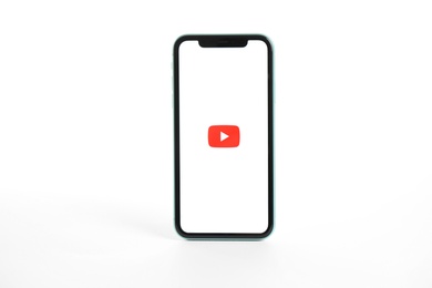 Photo of MYKOLAIV, UKRAINE - JULY 9, 2020: iPhone 11 with Youtube app on screen against white background