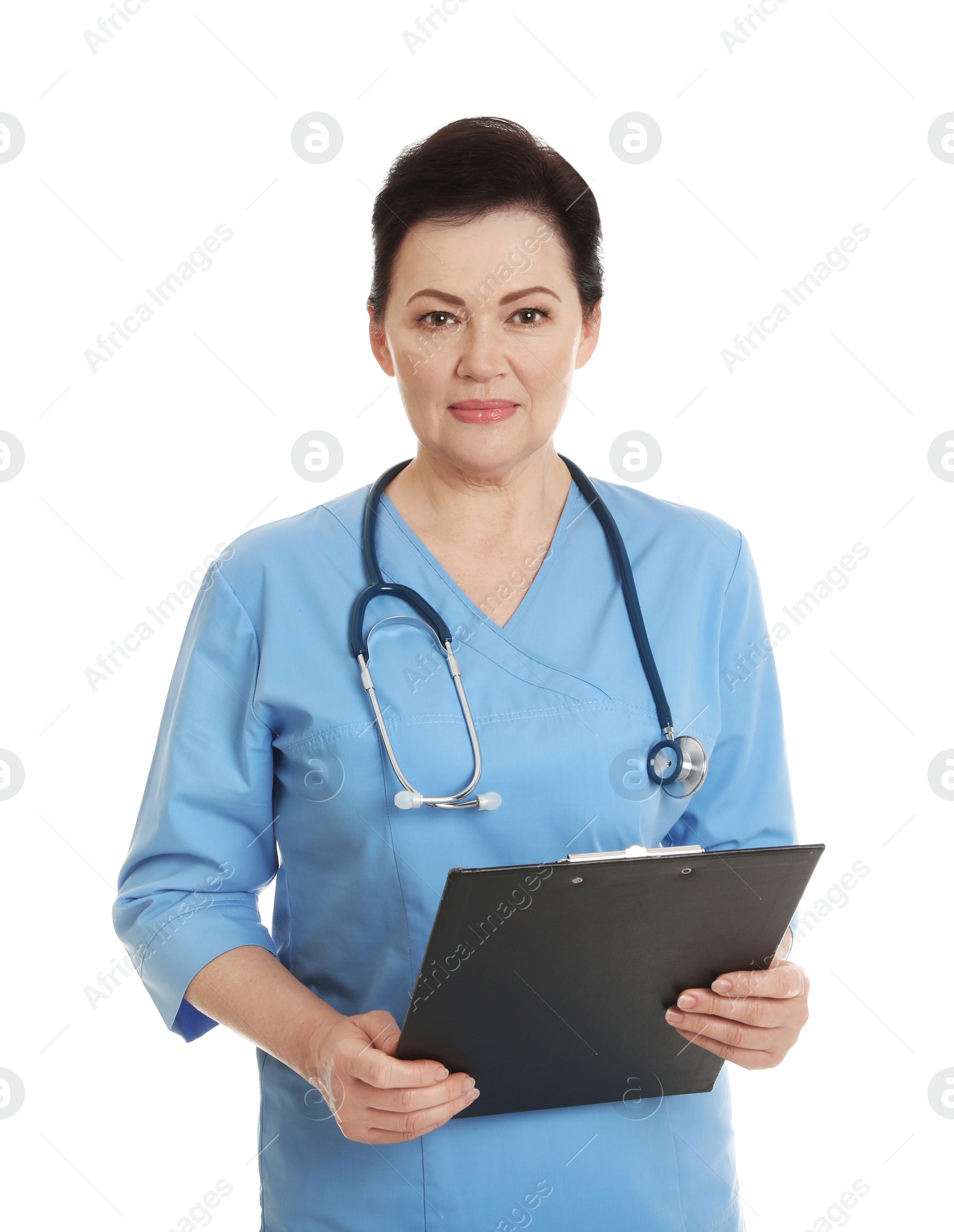 Photo of Portrait of female doctor in scrubs with clipboard isolated on white. Medical staff