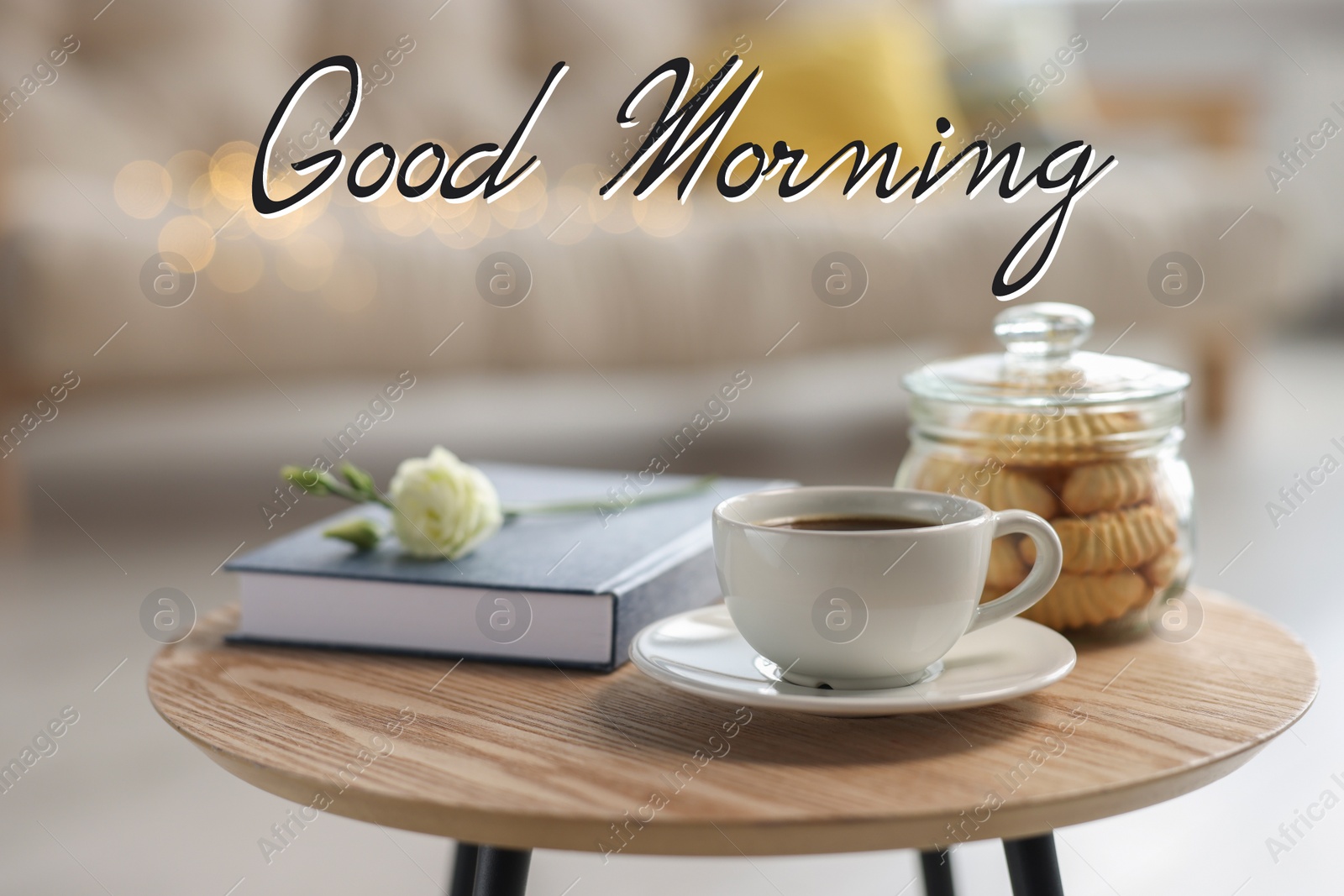 Image of Good morning! Cup of coffee, cookies, book and eustoma flower on wooden table in living room