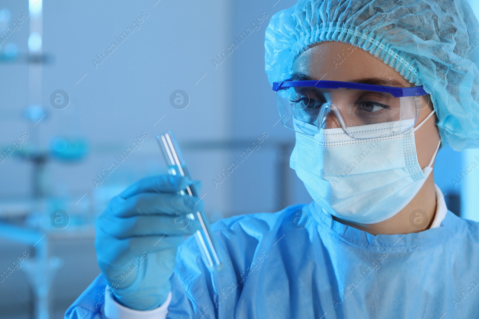 Photo of Scientist working with sample in laboratory. Medical research