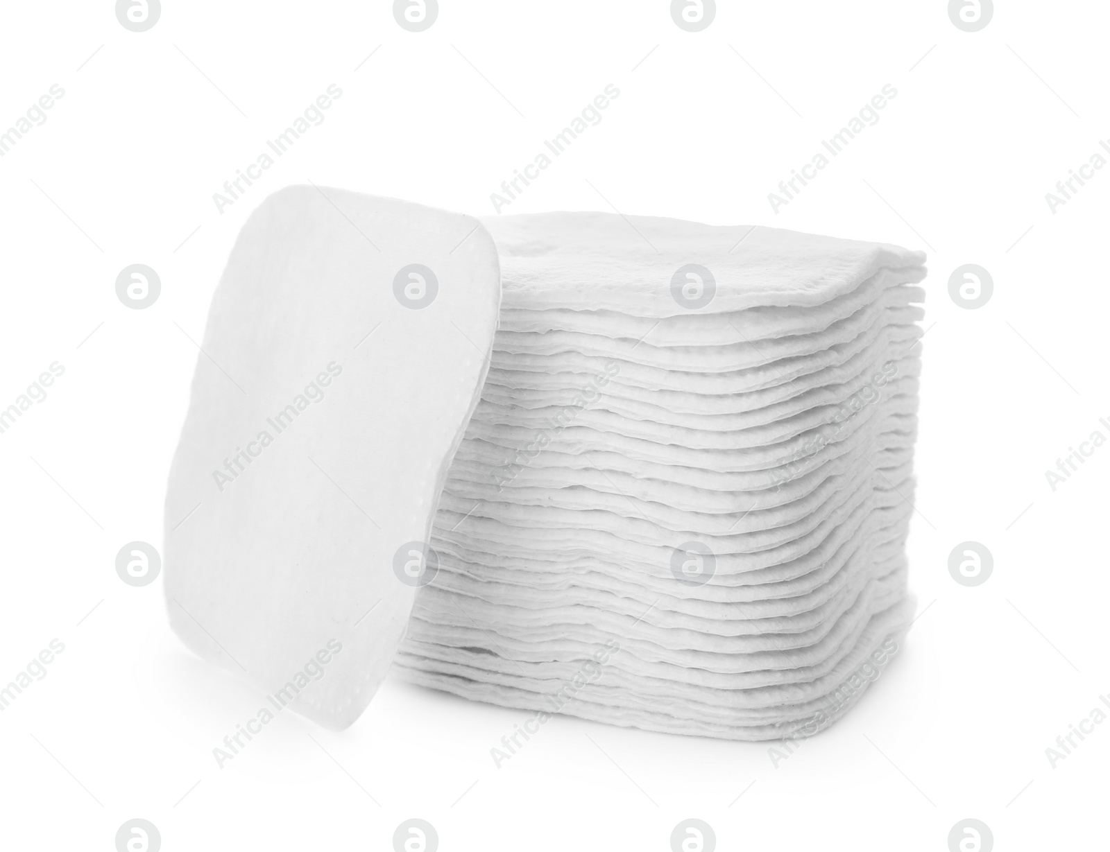 Photo of Pile of cotton pads on white background