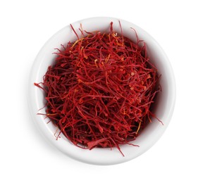 Photo of Dried saffron in bowl isolated on white, top view