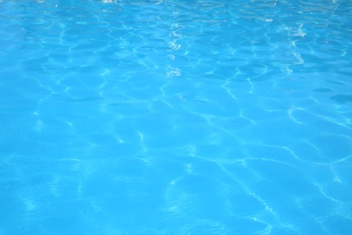 Photo of Swimming pool with clear water as background, closeup