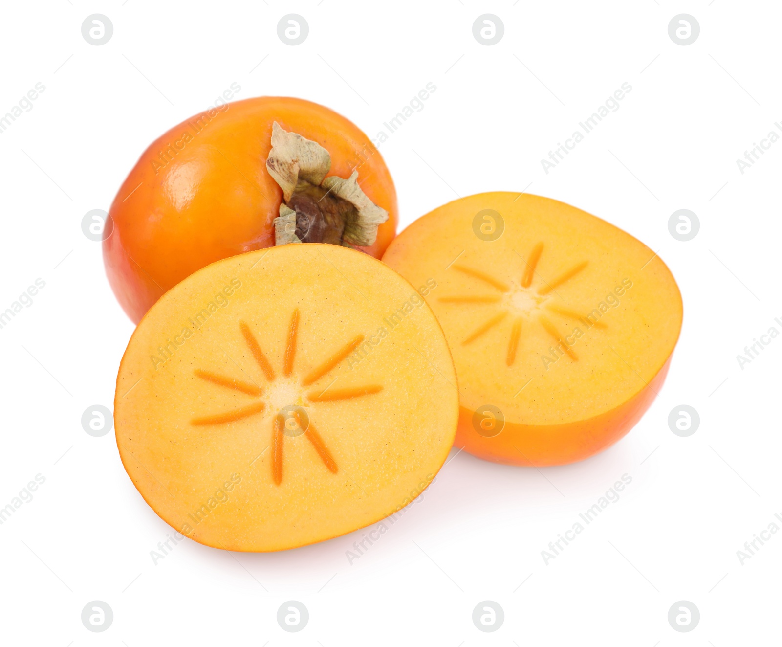 Photo of Whole and cut persimmon fruits isolated on white, top view