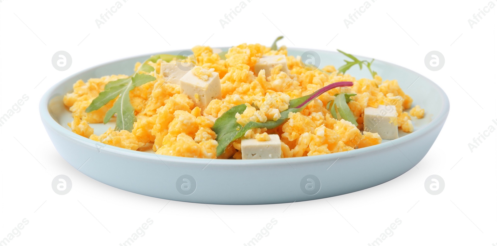 Photo of Plate with delicious scrambled eggs and tofu isolated on white