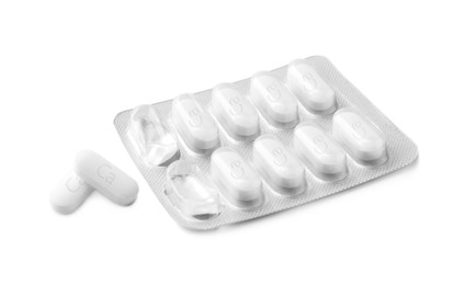 Photo of Blister pack with calcium supplement pills on white background