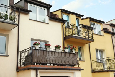 Photo of Beautiful view of building with stylish balconies