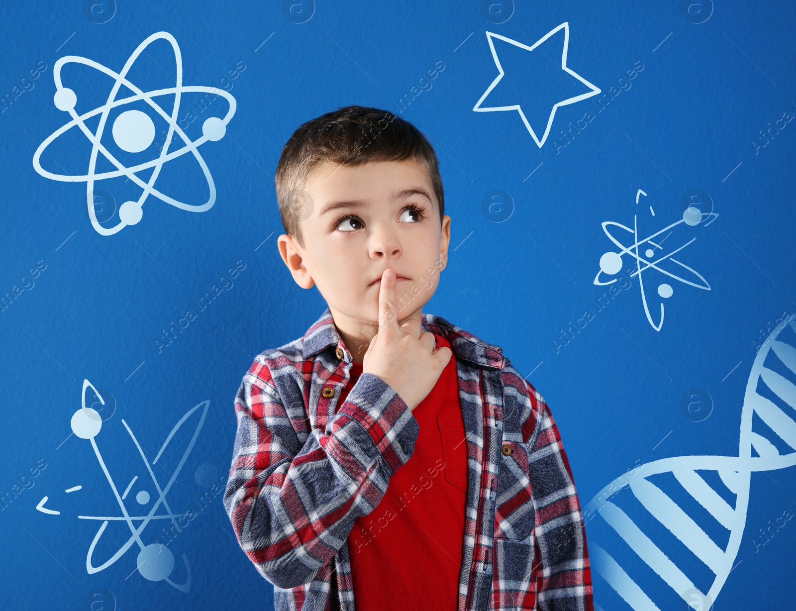 Image of Thoughtful little boy on blue background with different drawings