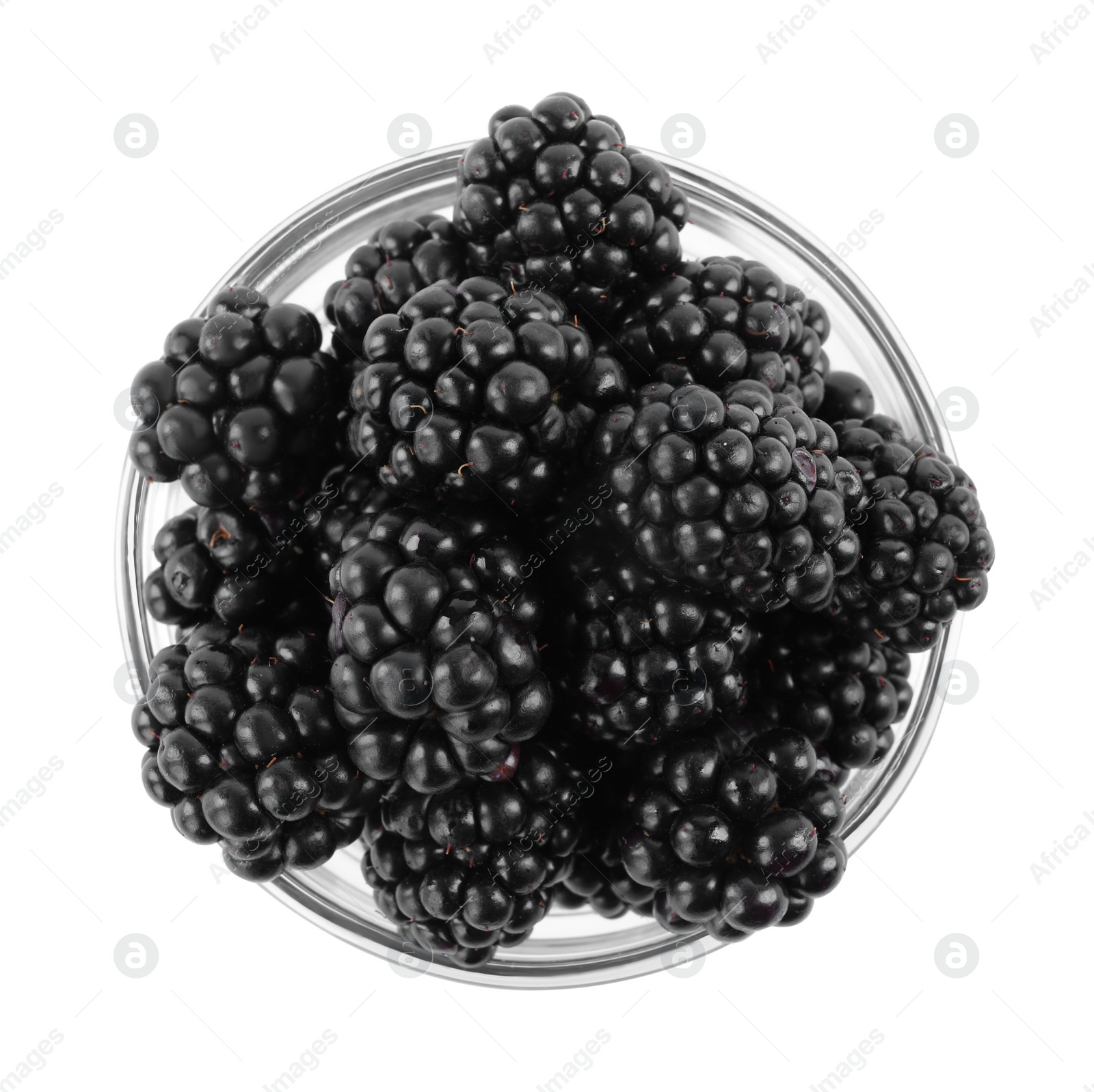 Photo of Fresh ripe blackberries in glass bowl isolated on white, top view