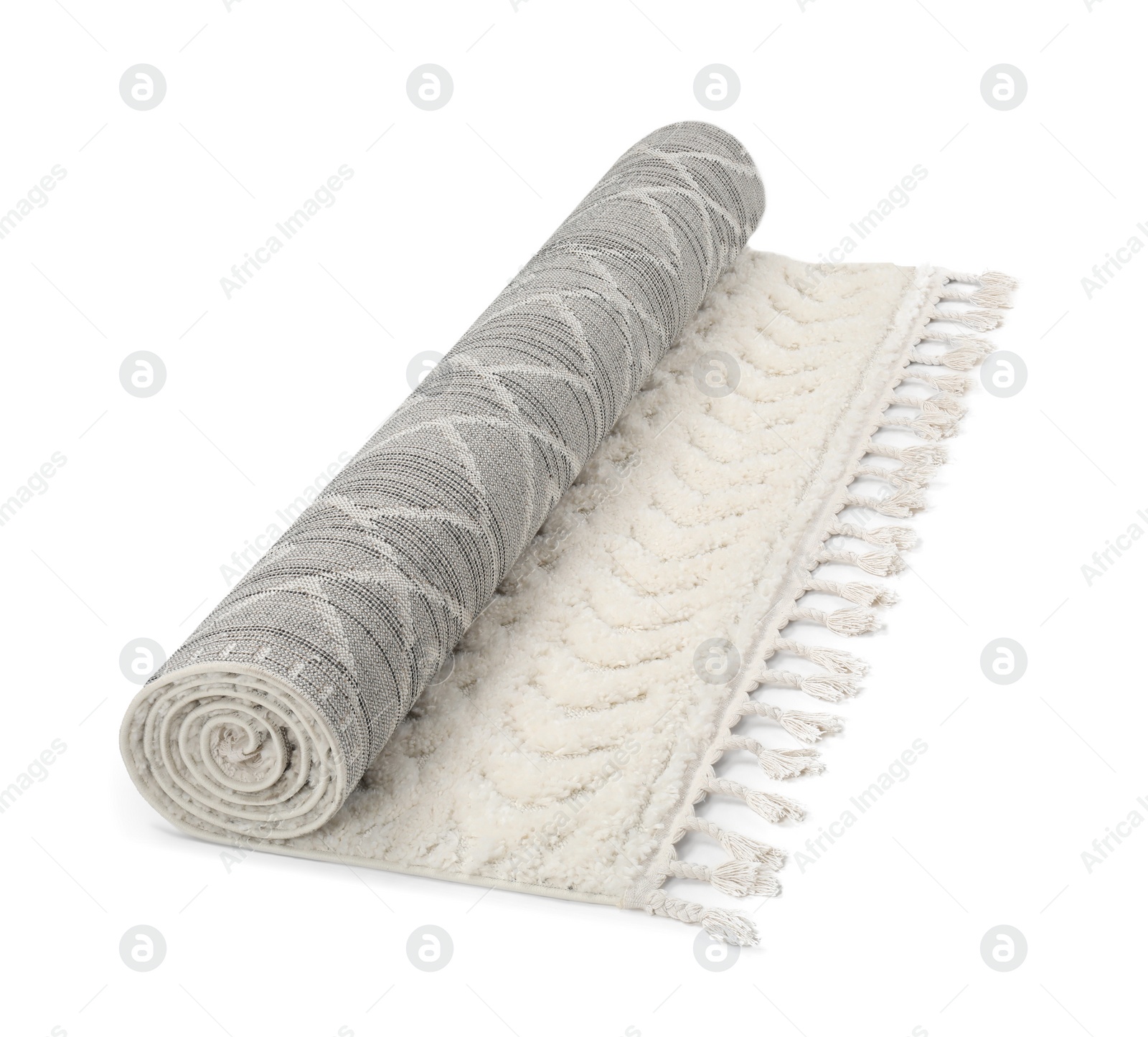 Photo of Rolled carpet with pattern on white background. Interior element