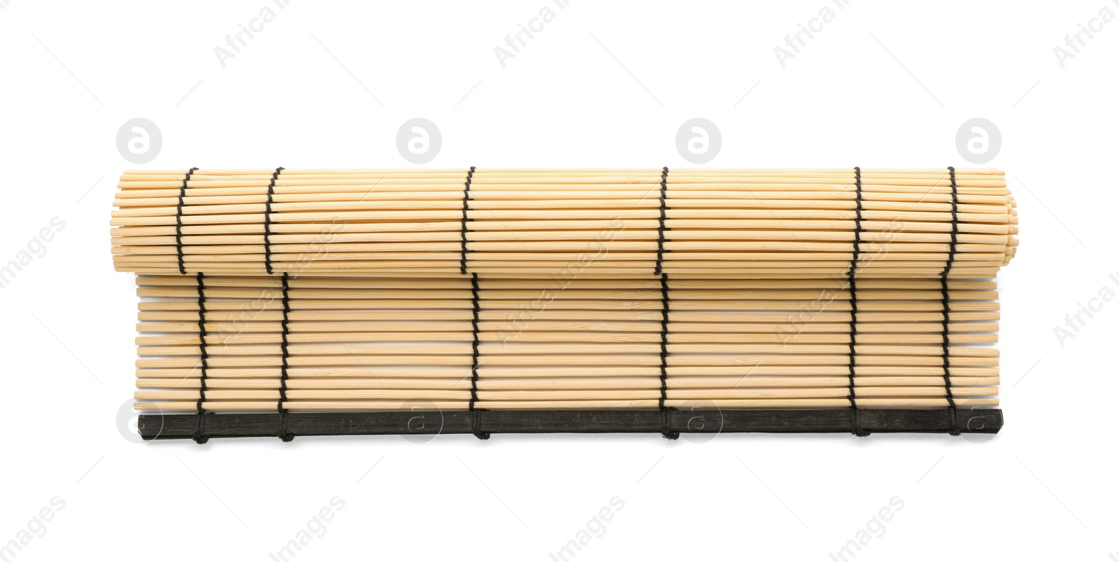 Photo of Rolled sushi mat made of bamboo on white background, top view