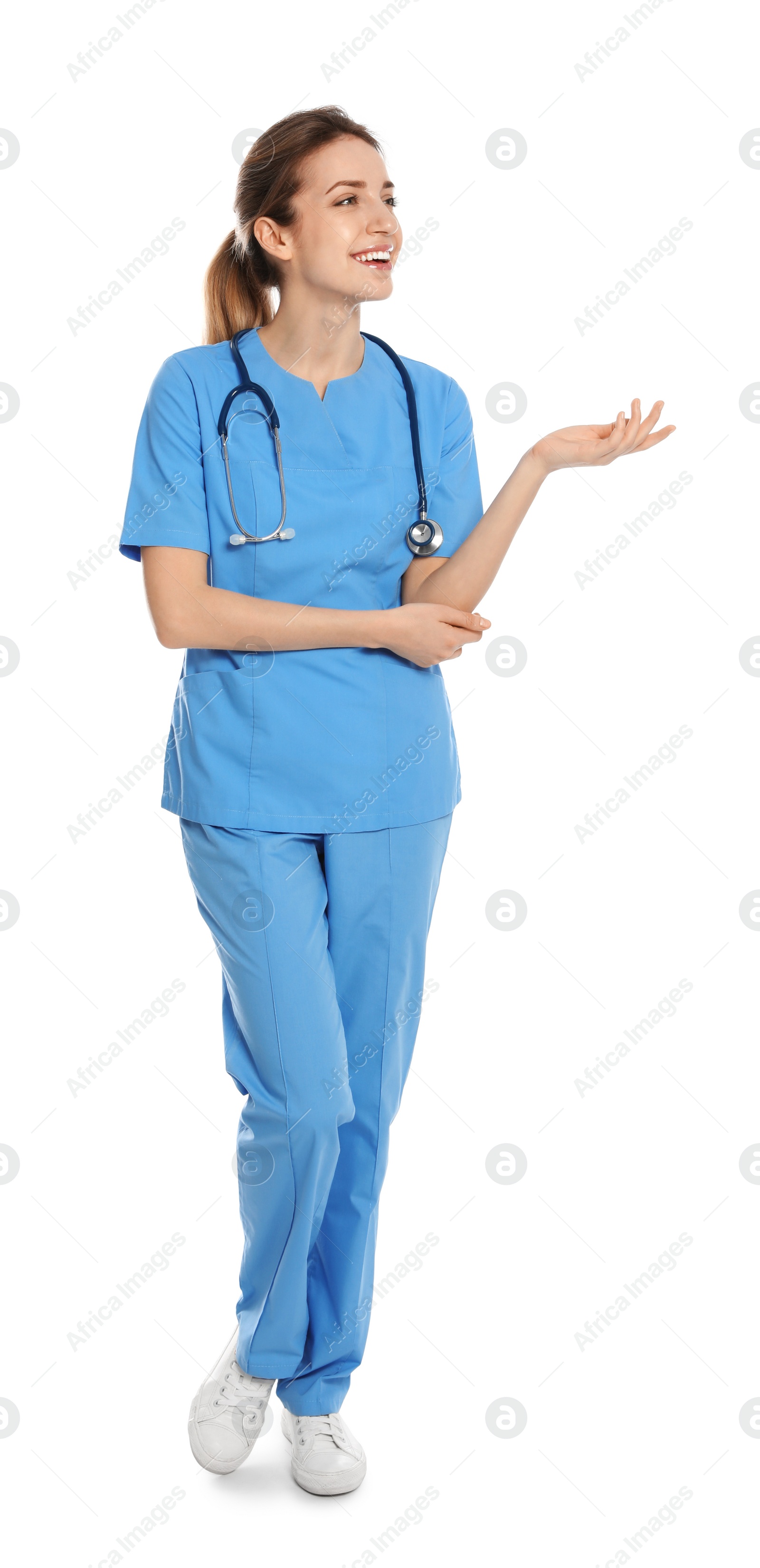 Photo of Full length portrait of medical doctor with stethoscope isolated on white