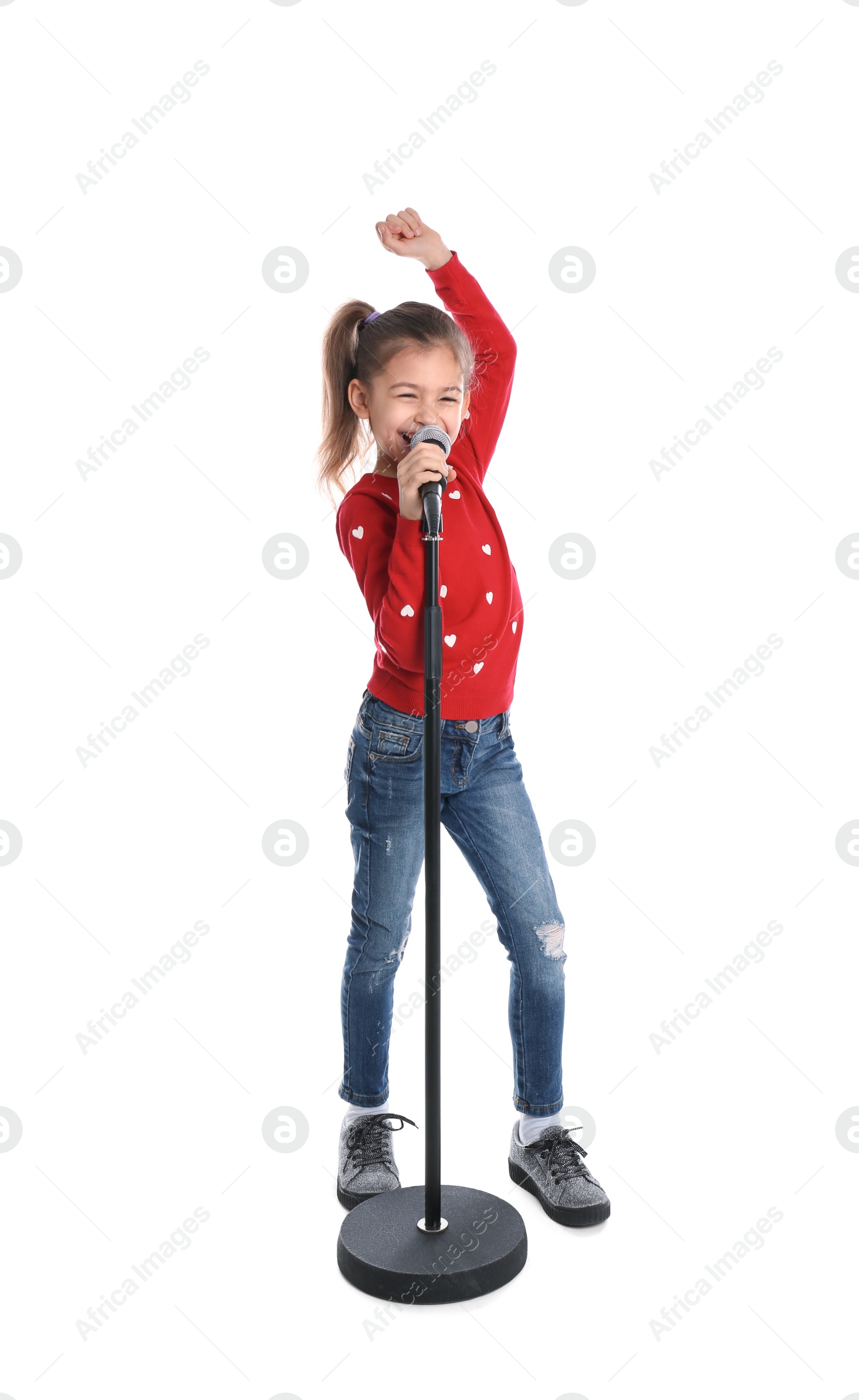Photo of Cute funny girl with microphone on white background