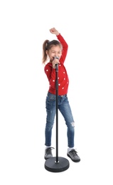 Cute funny girl with microphone on white background