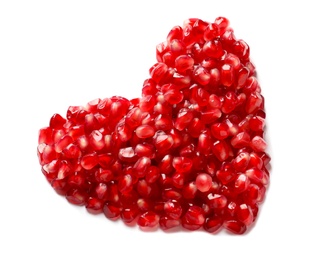 Photo of Heart made of pomegranate seeds on white background, top view. Healthy diet