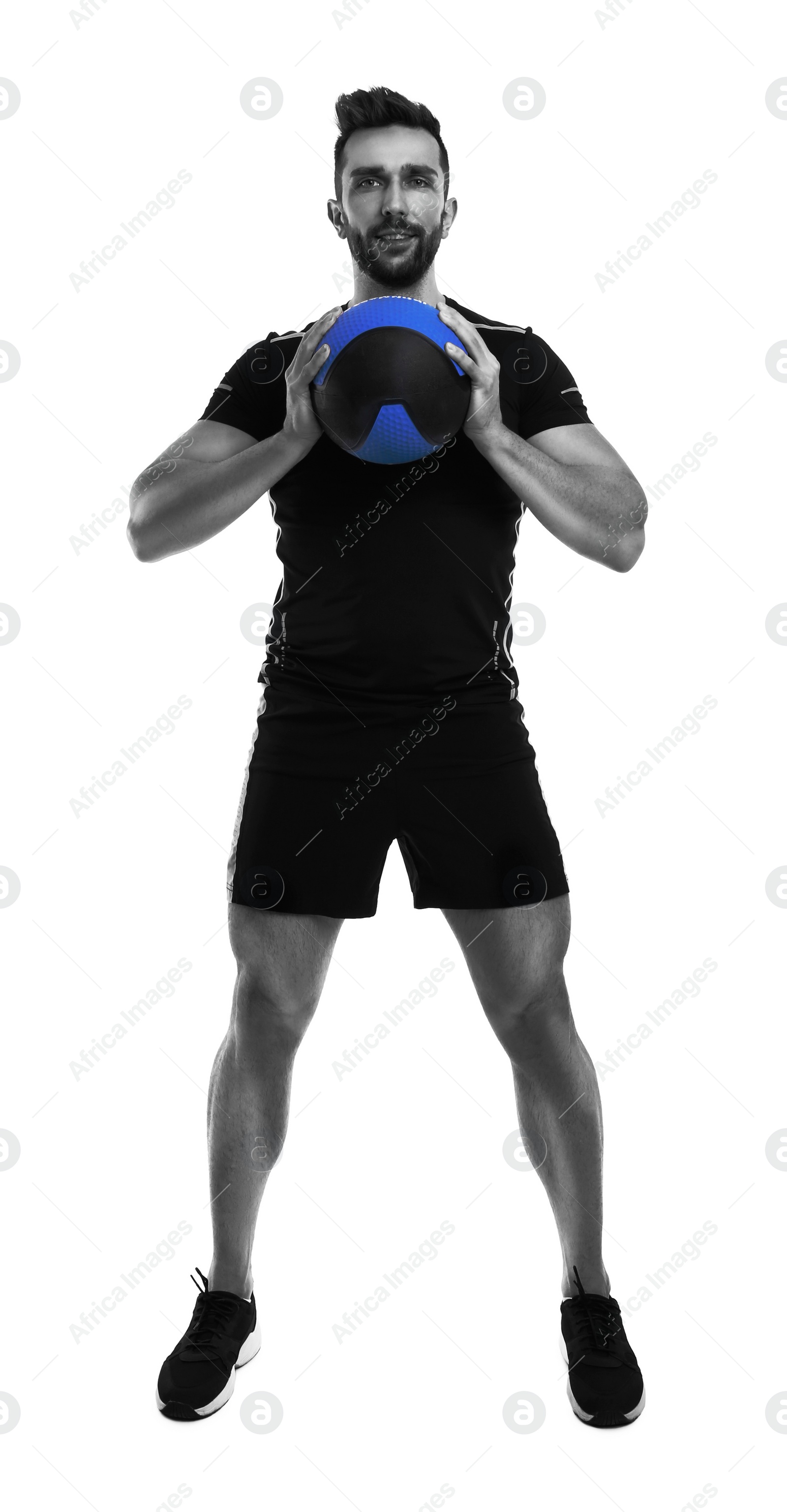 Image of Athletic man doing exercise with medicine ball isolated on white